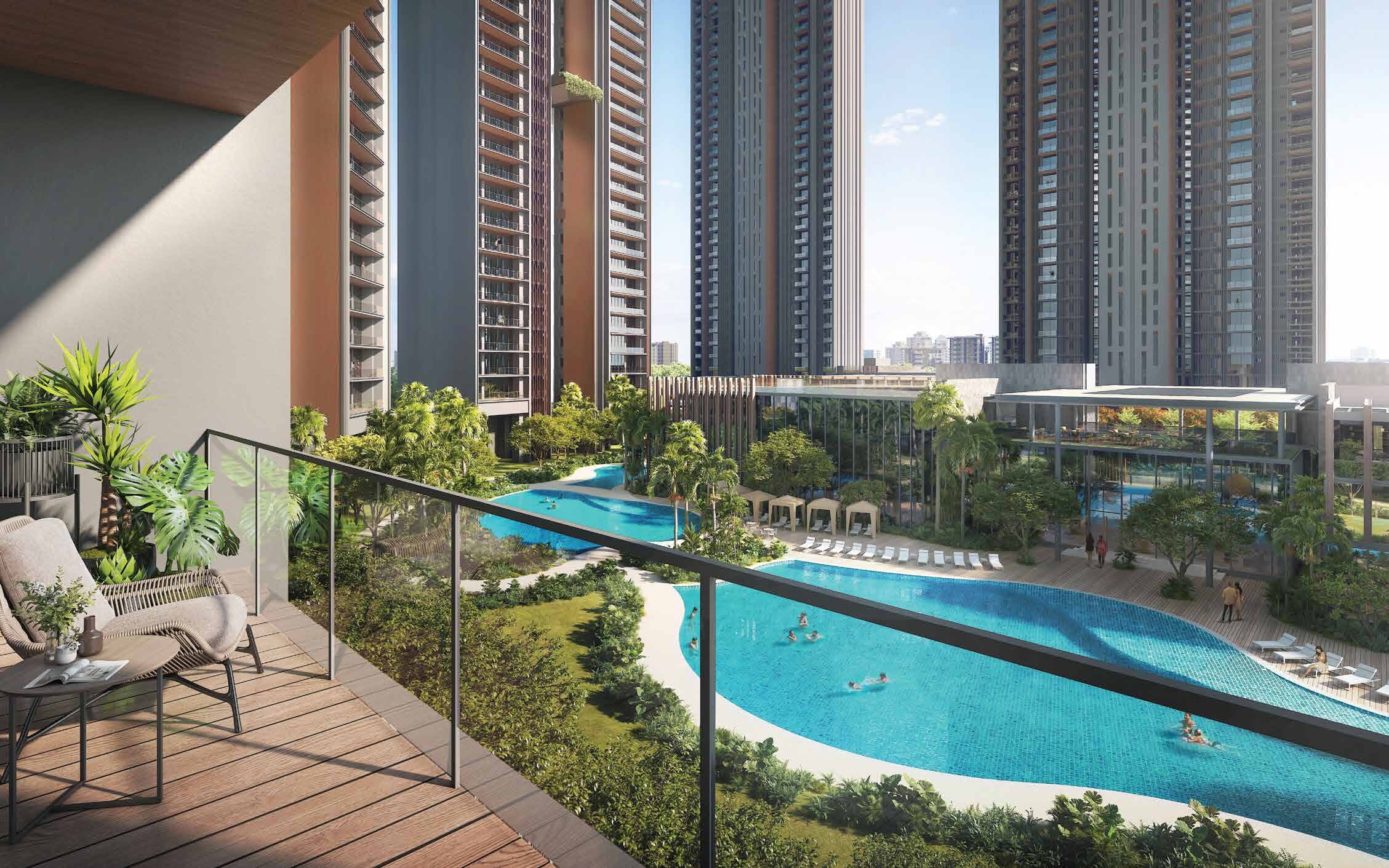 Residential towers rising above the lagoon pool, daytime